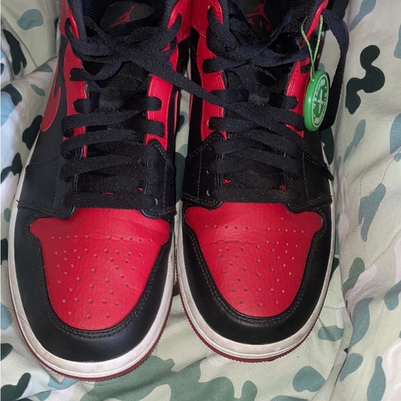 Black and red Jordan 1s